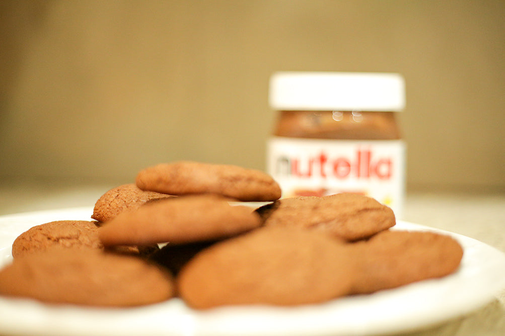 Nutella protein cookies with Nutella jar in background