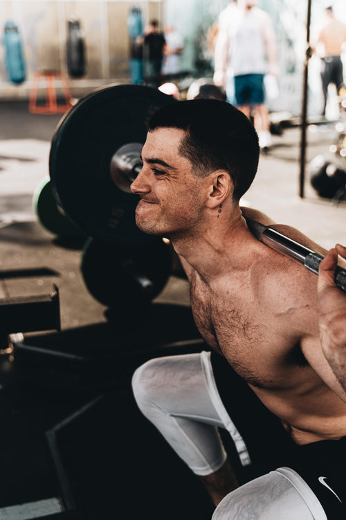 Barbell back squat for bulking and muscle gain during strength training workout