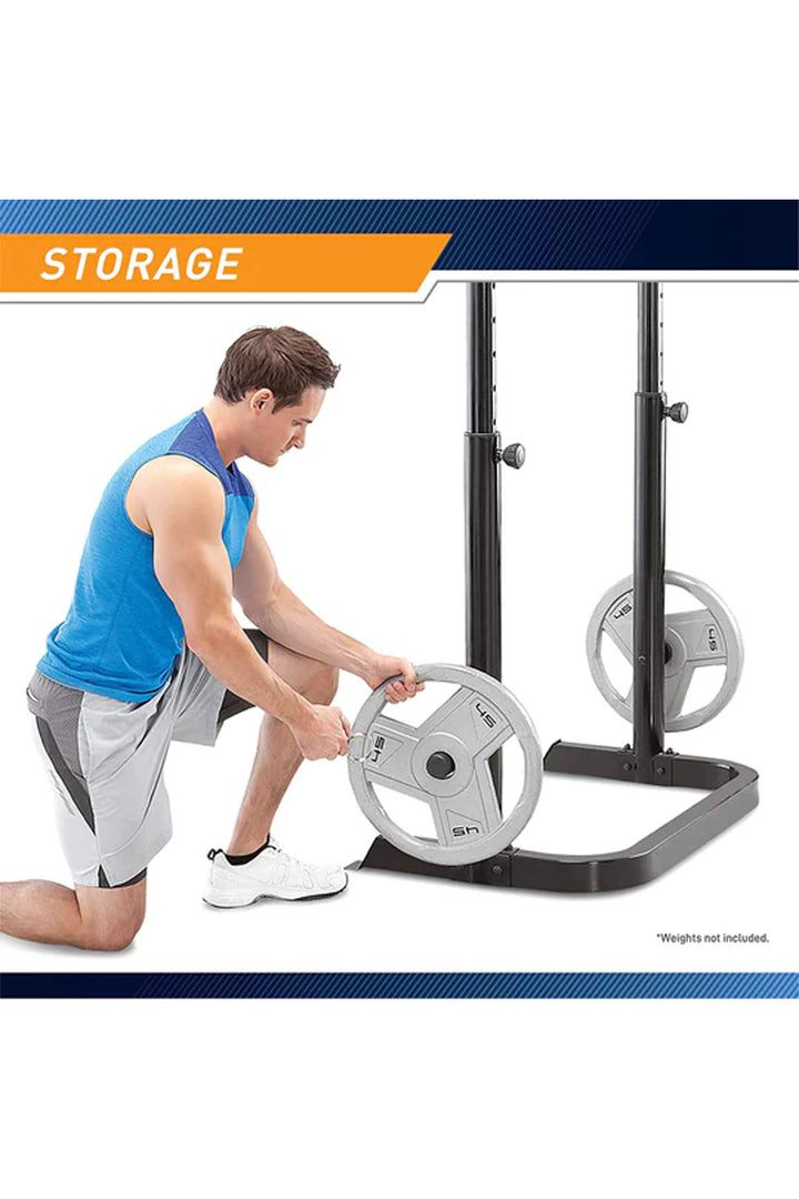 man taking weights off weight plate holder