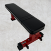 black and red flat gym bench