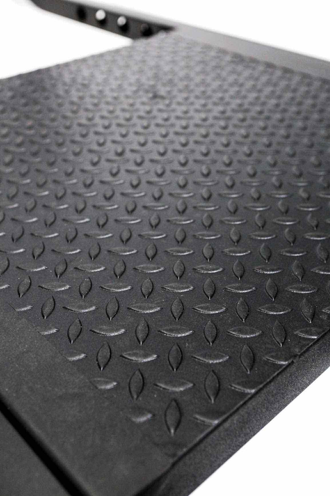 Black steel foot plate with rigid surface