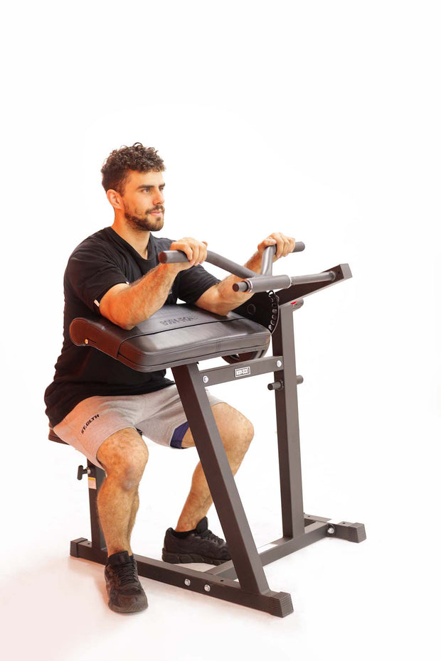 man doing tricep extensions on seated tricep machine