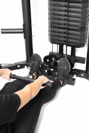 Female using low pulley cable on functional trainer